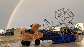 Burning Man attendees begin exodus of festival after being trapped by flooding, mud